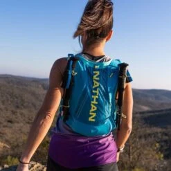 Nathan VaporAiress 2 Drinkrugzak 7 Liter Blauw Dames -Sport Uitgebreide Kleding Winkel n vaporairess